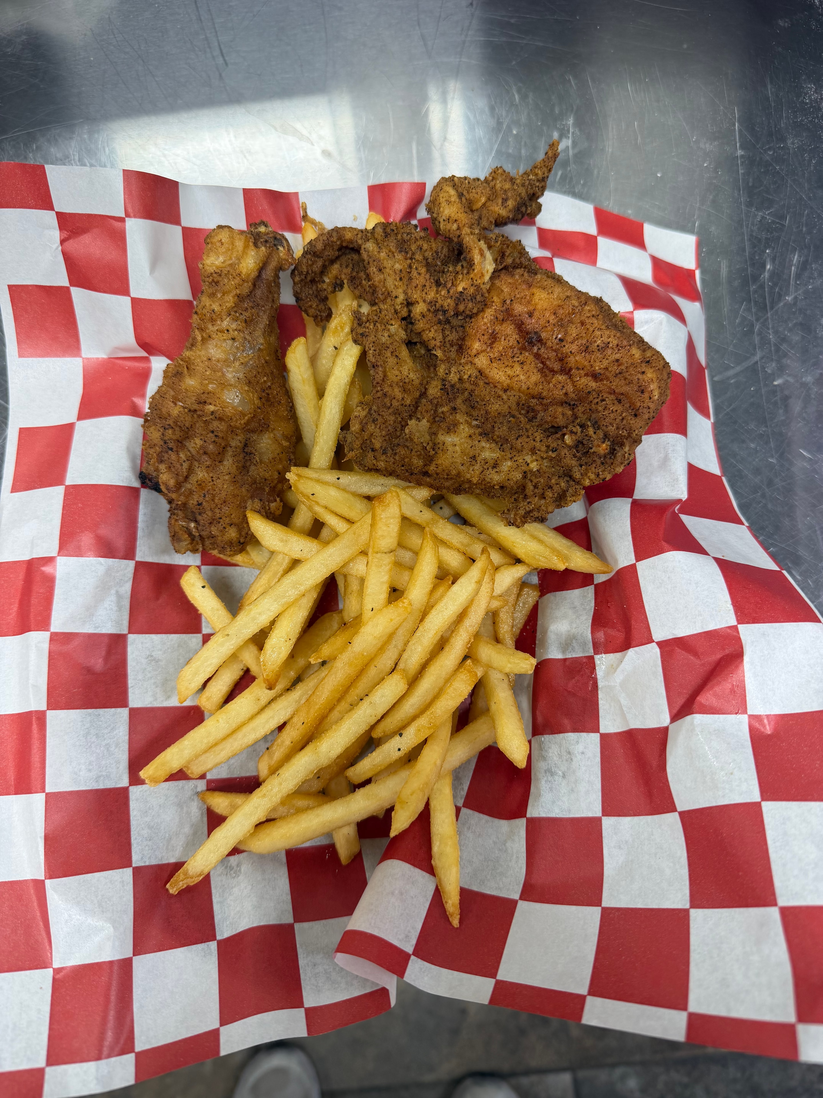 Broasted chicken and fries at Nina's Pizza Shop