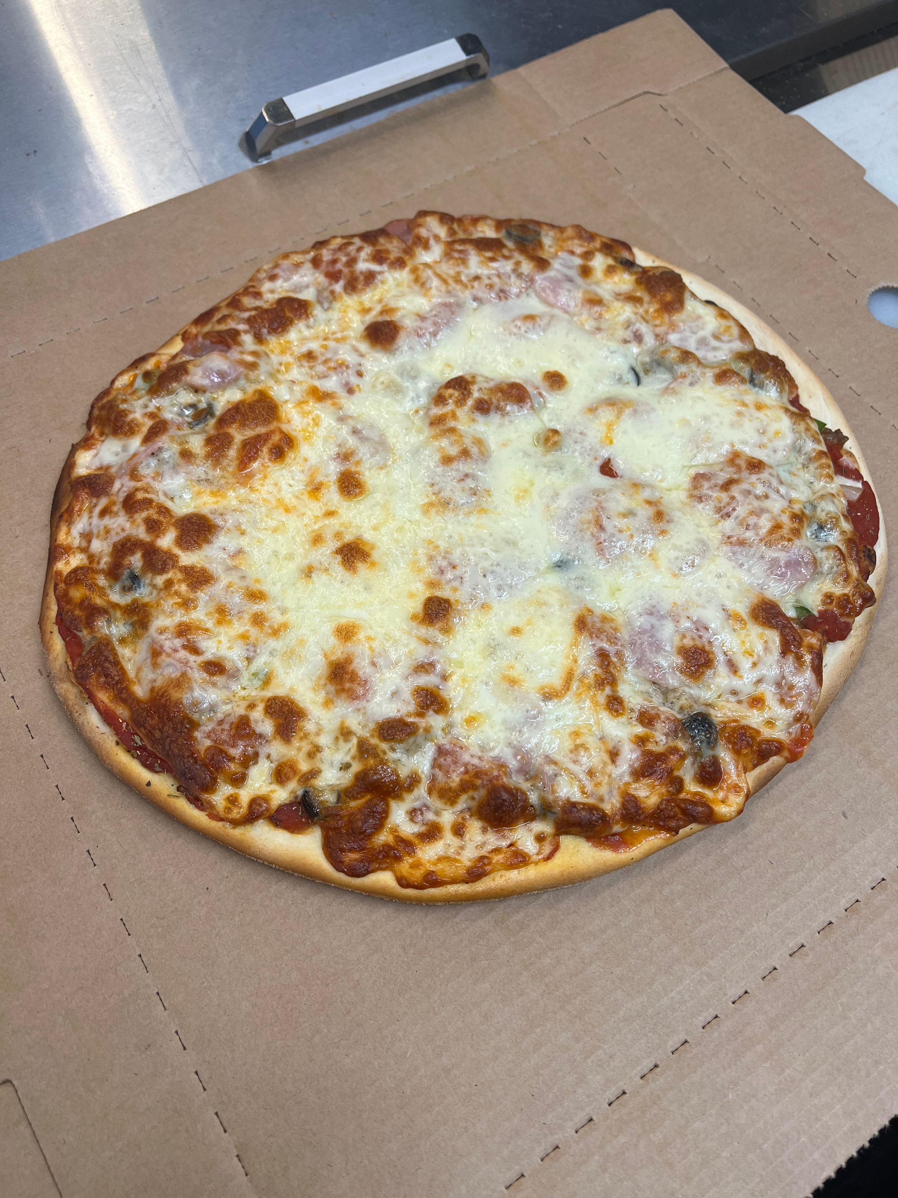 Specialty pizza at Nina's
