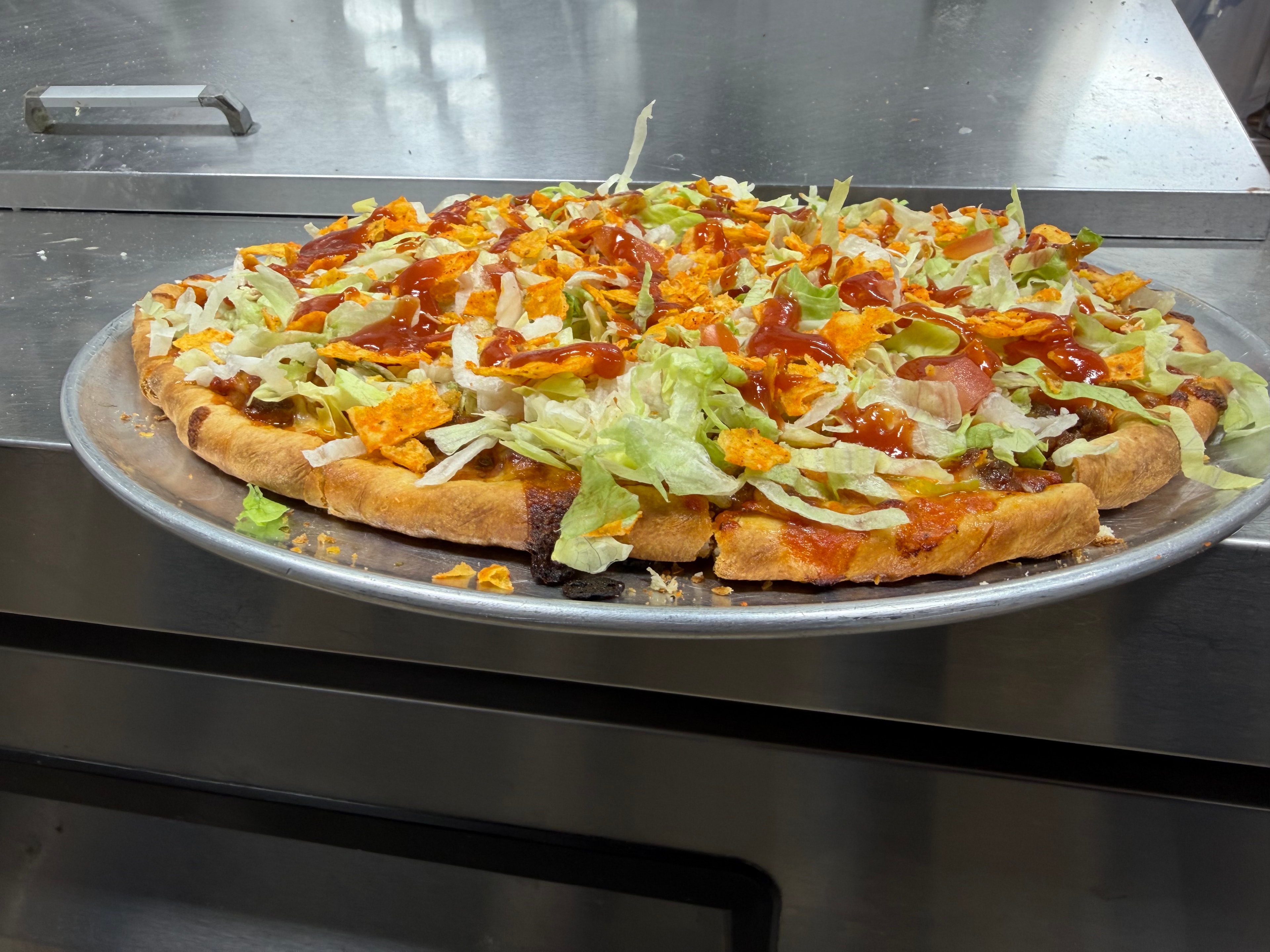 Hot pizza at Nina's Pizza Shop