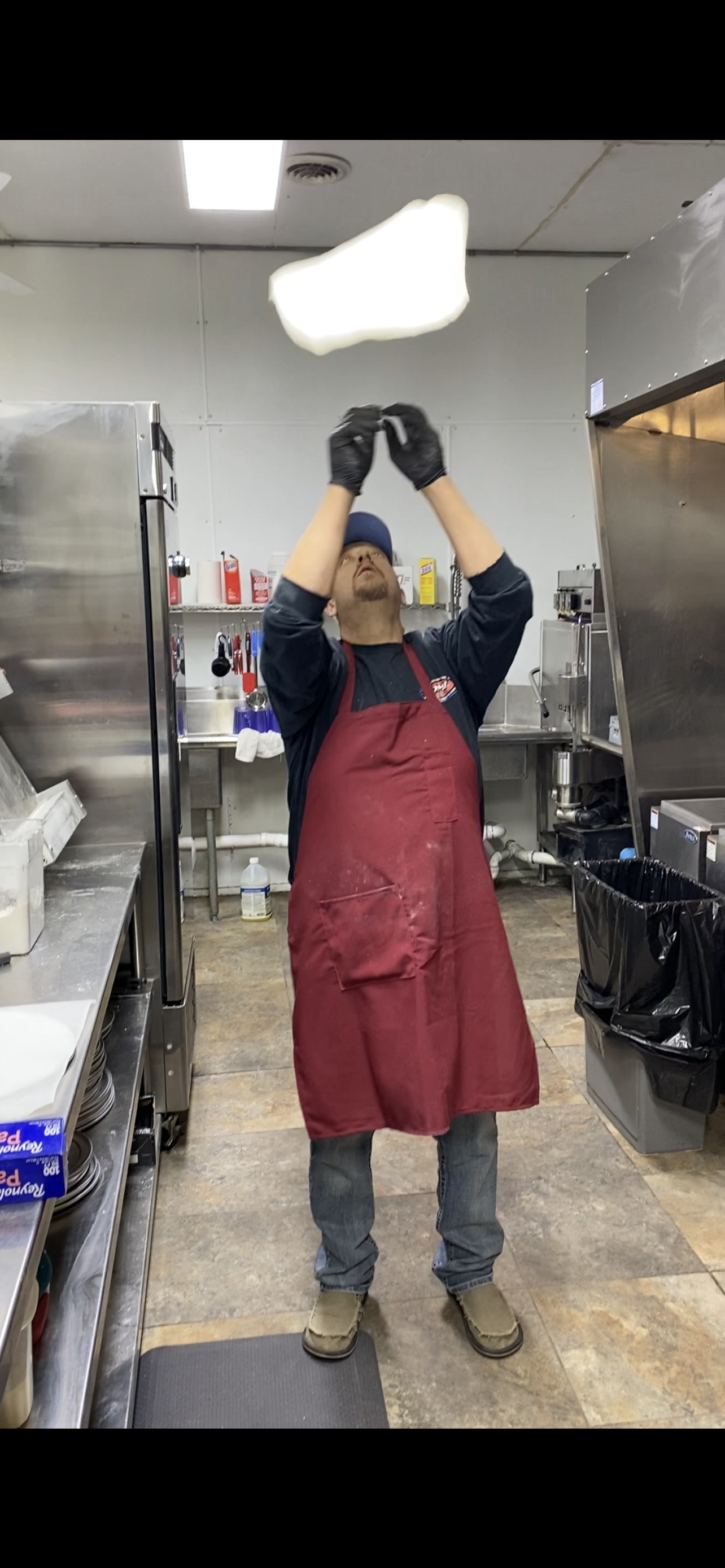 Dough toss — launch at Nina's Pizza Shop