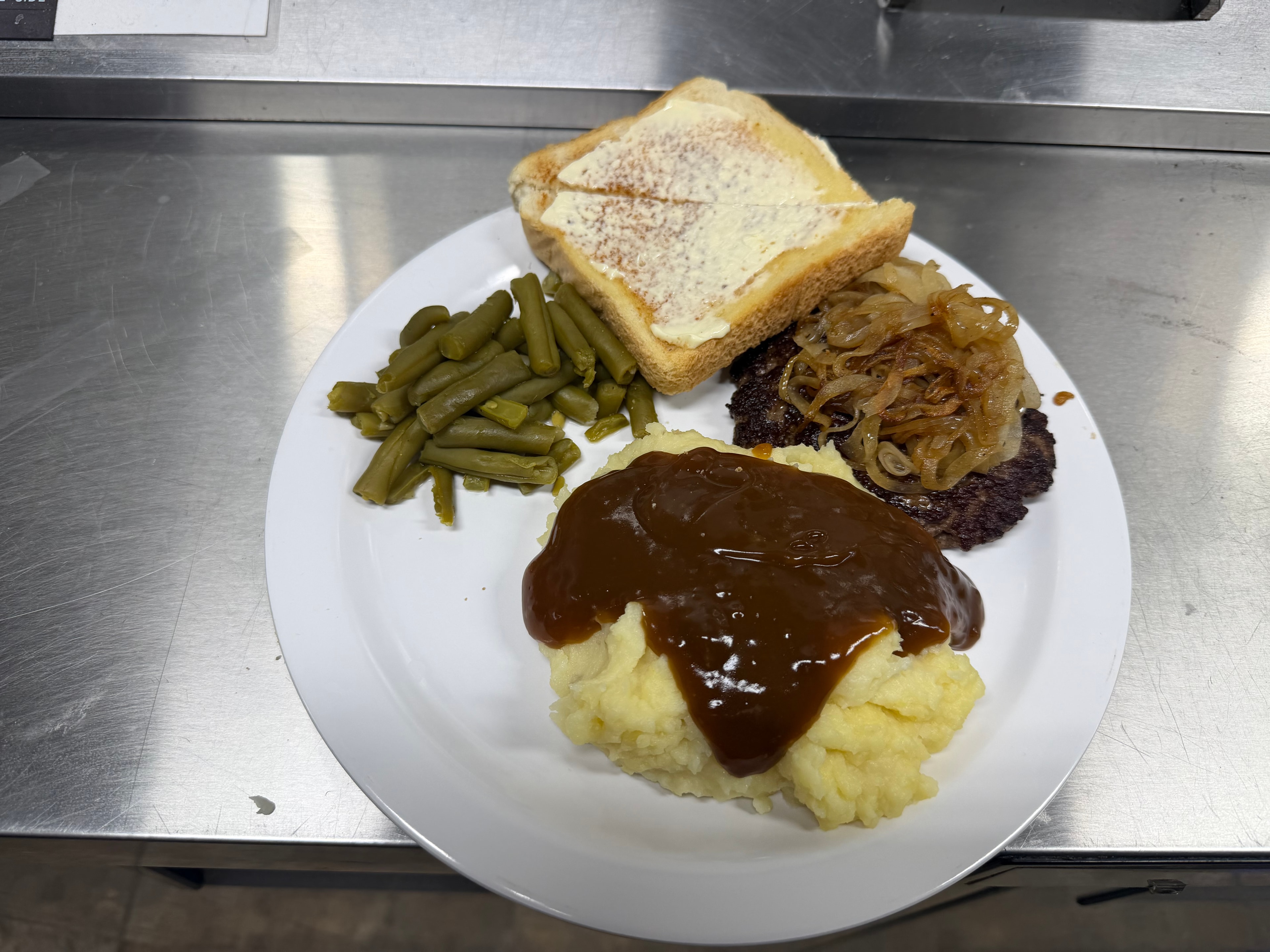 Hamburger steak with mashed potatoes and gravy